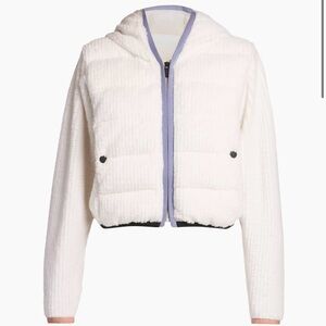 A plush chenille finish elevates this zip-up cardigan